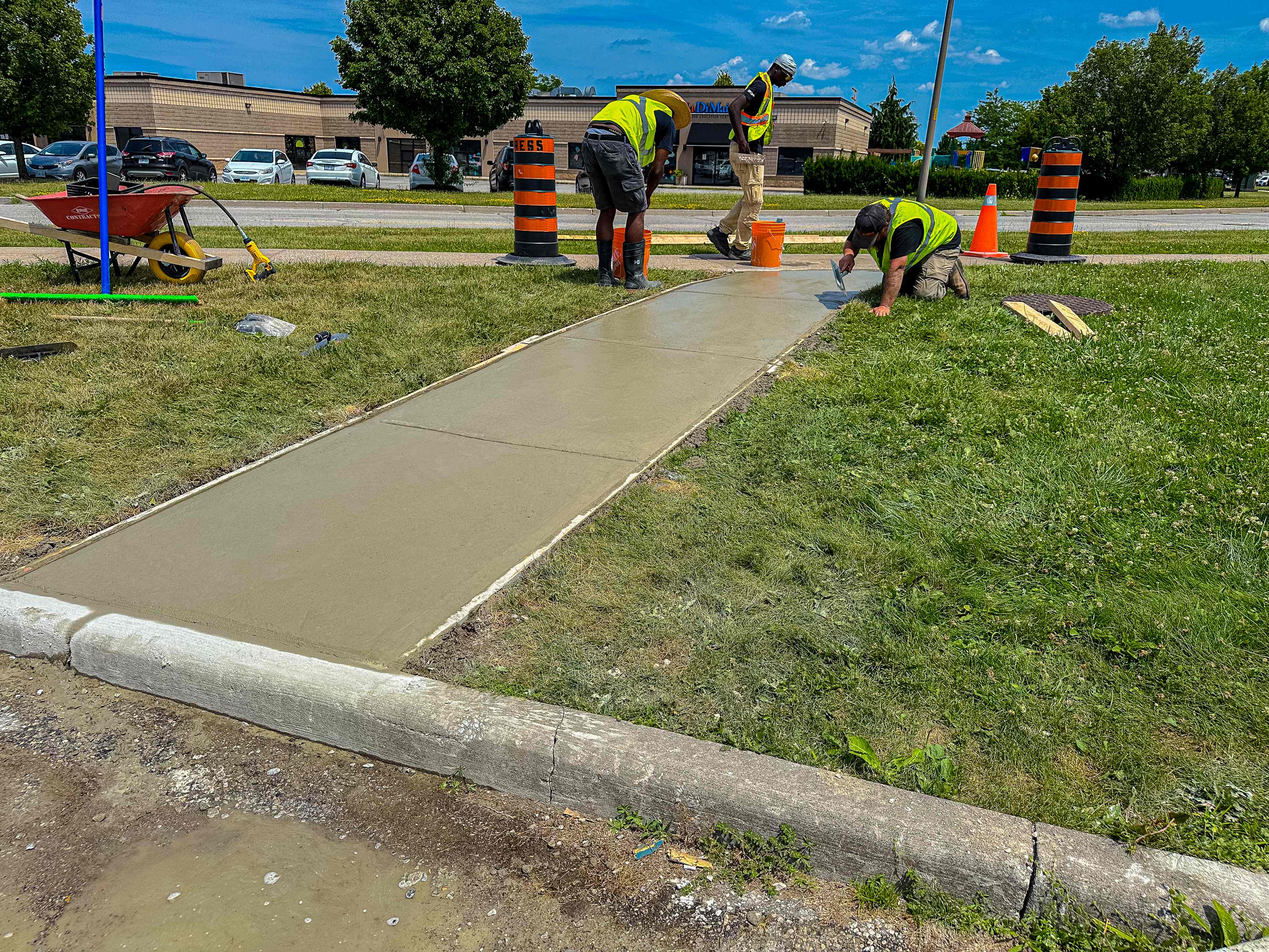 Professional concrete sidewalk installation and finishing